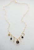 Jill Celestial Black and Gold Charm Necklace