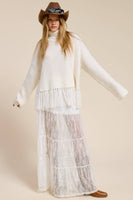 Fringe Hem Ribbed Turtleneck Sweater