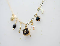 Jill Celestial Black and Gold Charm Necklace