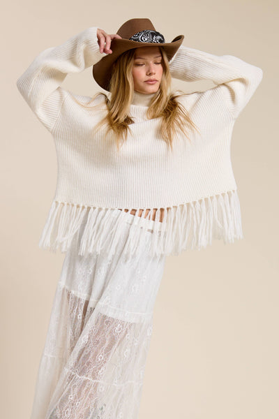 Fringe Hem Ribbed Turtleneck Sweater