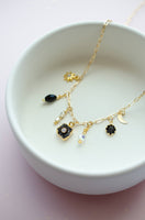 Jill Celestial Black and Gold Charm Necklace